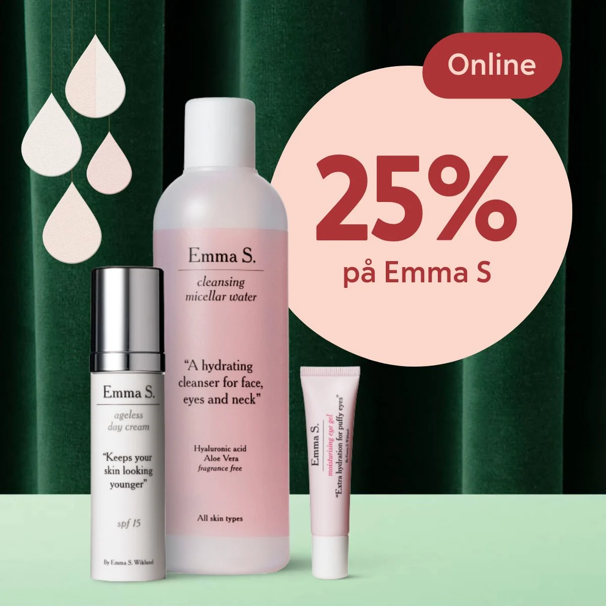 Tre Emma S. hudvårdsprodukter framför en grön sammetsbakgrund med texten "25% på Emma S" i en rosa cirkel och en röd etikett med ordet "Online".